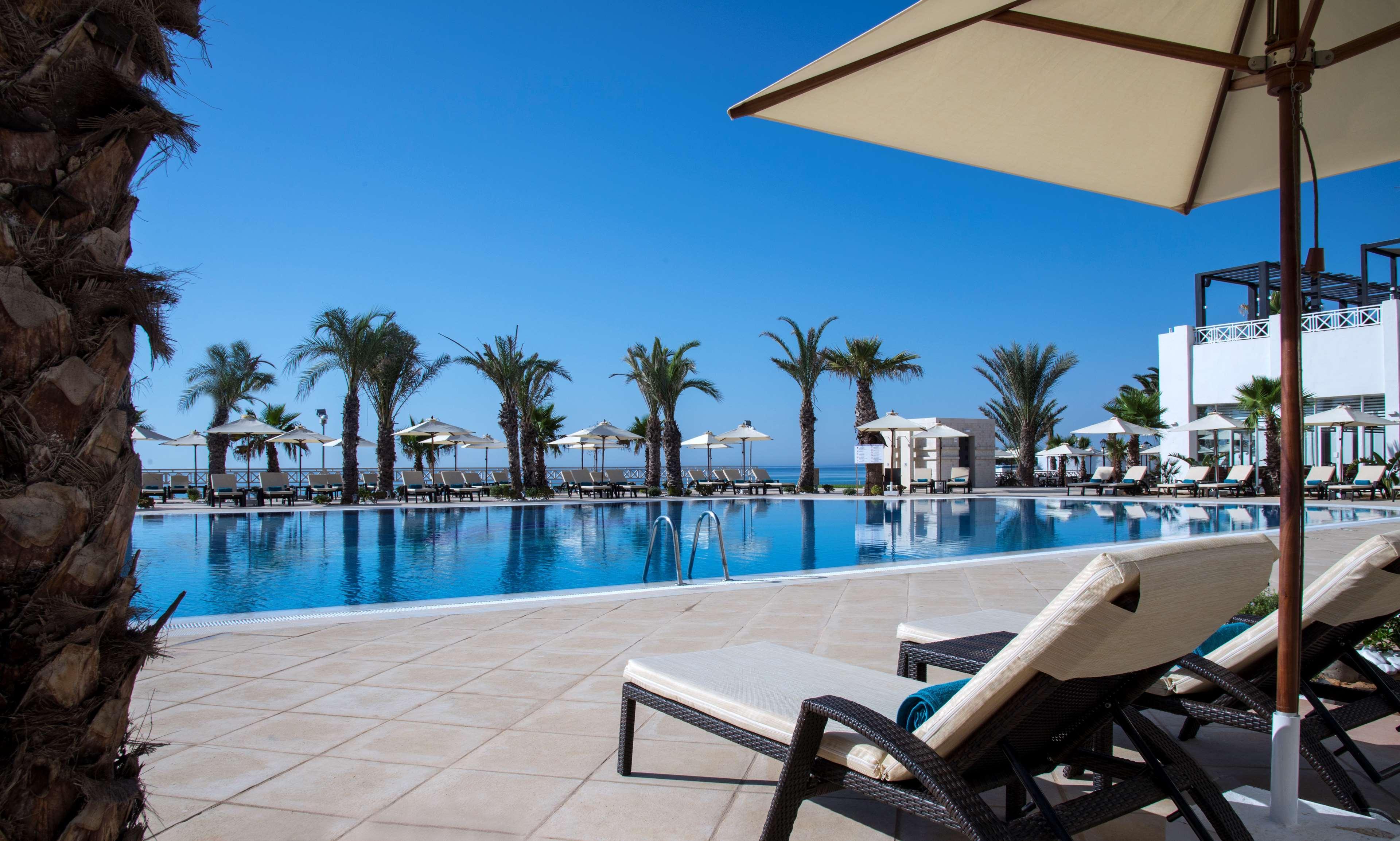 Radisson Blu Resort & Thalasso Hammamet Exterior foto The pool at the Royal Beach Palace